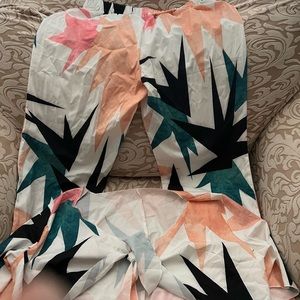 Never worn two pieces pant and short sleeve top set